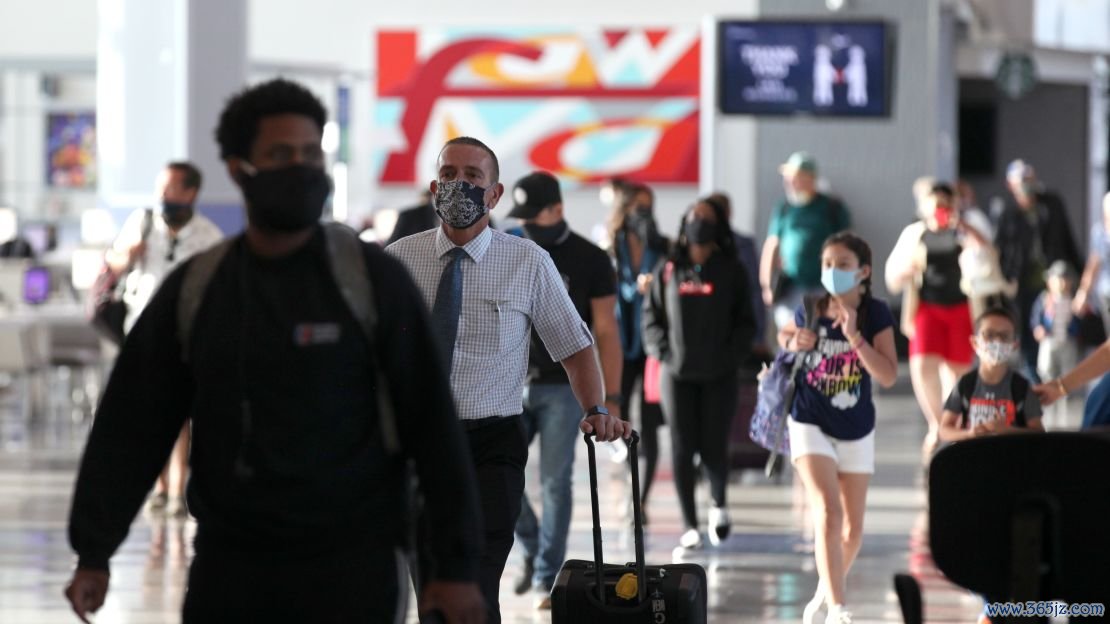 Passengers at the United Airlines terminal at George Bush Intercontinental Airport in Houston, Texas in May 2020.